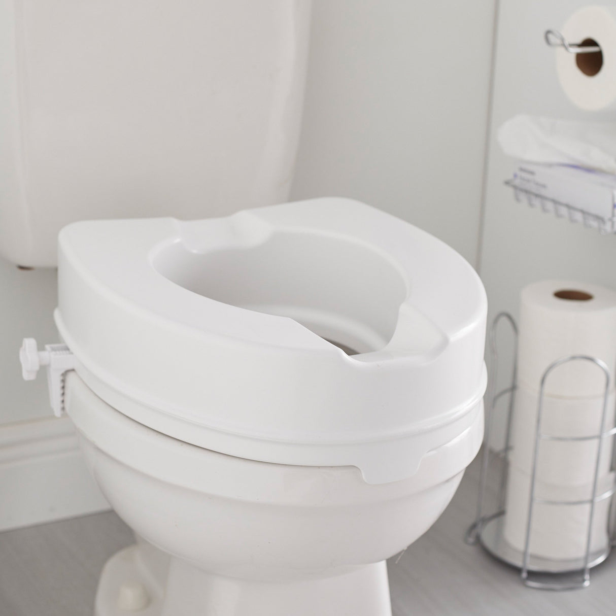 Raised Toilet Seat McKesson 4 Inch Height White 400 lbs. Weight Capacity