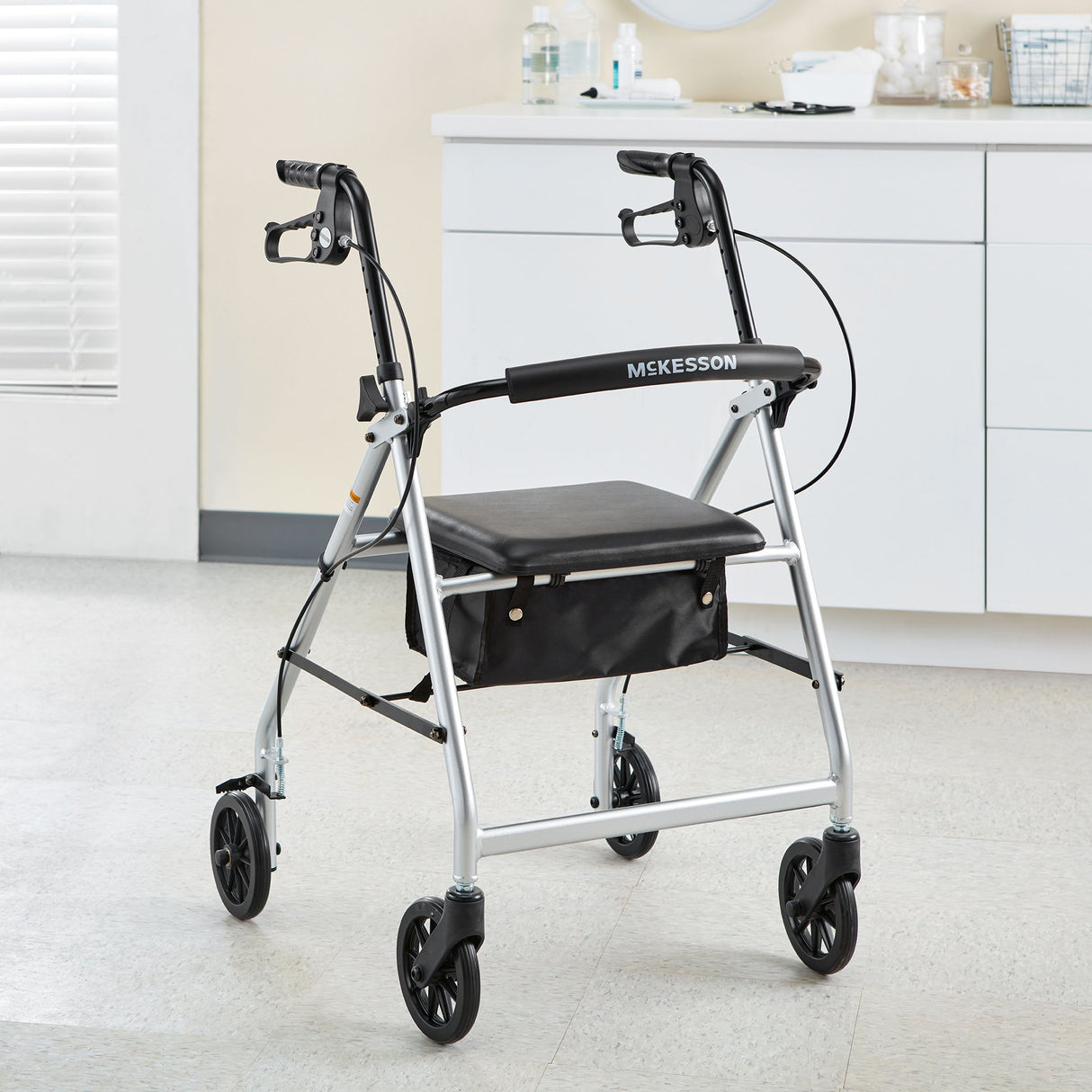 4 Wheel Rollator McKesson Silver Adjustable Height / Folding Aluminum Frame